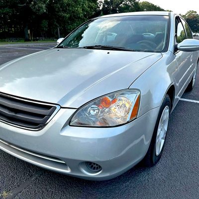 2002-2004 Nissan Altima Crystal Headlights w/ Amber Reflector Chrome/Clear