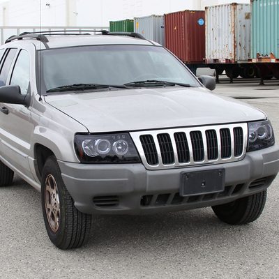 1999-2004 Jeep Grand Cherokee Dual Halo Projector Headlights Black/Smoke