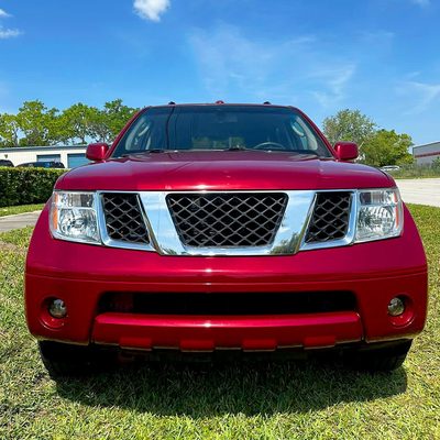 2005-2008 Nissan Frontier/2005-2006 Pathfinder Factory Headlights Chrome/Clear