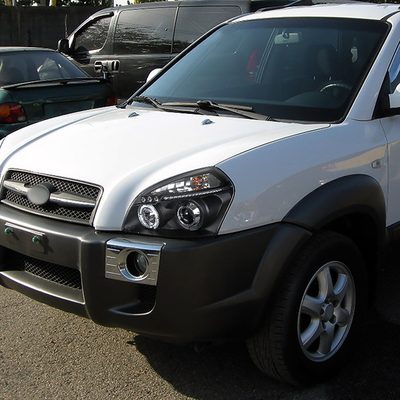 2005-2009 Hyundai Tucson Single Halo Projector Headlights Matte Black/Clear
