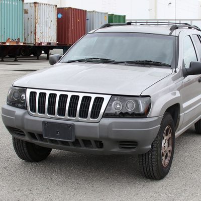 1999-2004 Jeep Grand Cherokee Dual Halo Projector Headlights Jet Black/Clear