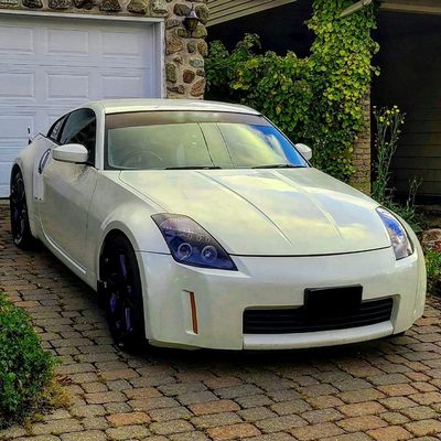 2003-2005 Nissan 350Z Dual Halo Projector Headlights Glossy Black/Smoke Lens