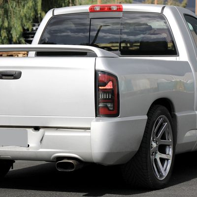 2002-2006 Dodge RAM 1500/2500/3500 Red LED Bar Tail Lights Matte Black/Clear