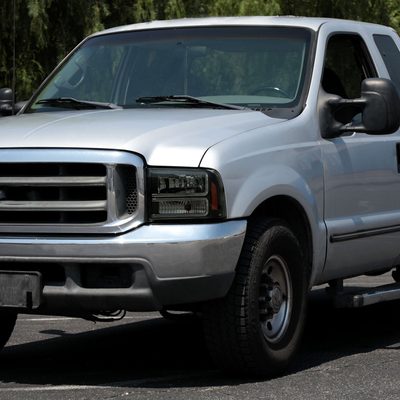 1999-2004 Ford F-250/350/450/550/Excursion Headlights Dual LED C-Bar Jet Black