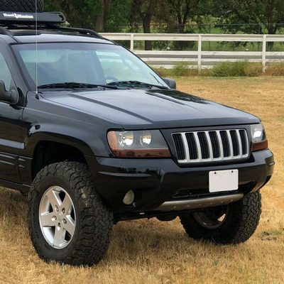 1999-2004 Jeep Grand Cherokee Factory Crystal Headlights Matt Black/Clear