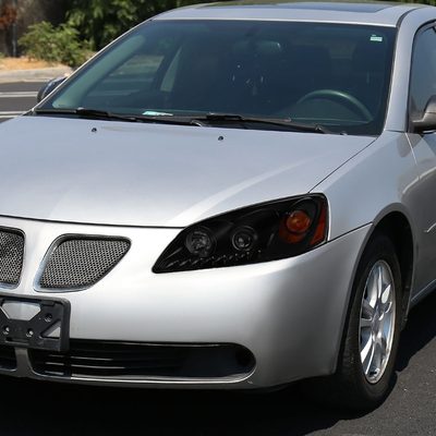 2005-2010 Pontiac G6 Projector Headlights w/ LED Light Strip Black/Smoke Lens