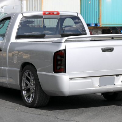 2002-2006 Dodge RAM 1500/2500/3500 Red LED Bar Tail Lights Matte Black/Smoke