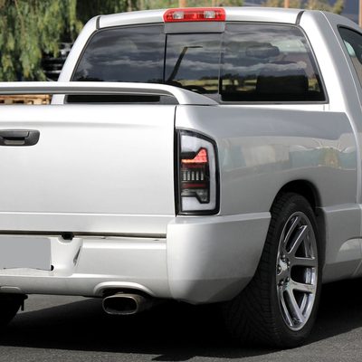 2002-2006 Dodge RAM 1500/2500/3500 White LED Bar Tail Lights Matte Black/Clear